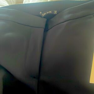 Zara black pant with red and white stripes down side of each leg